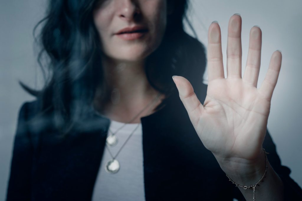 woman with hand out